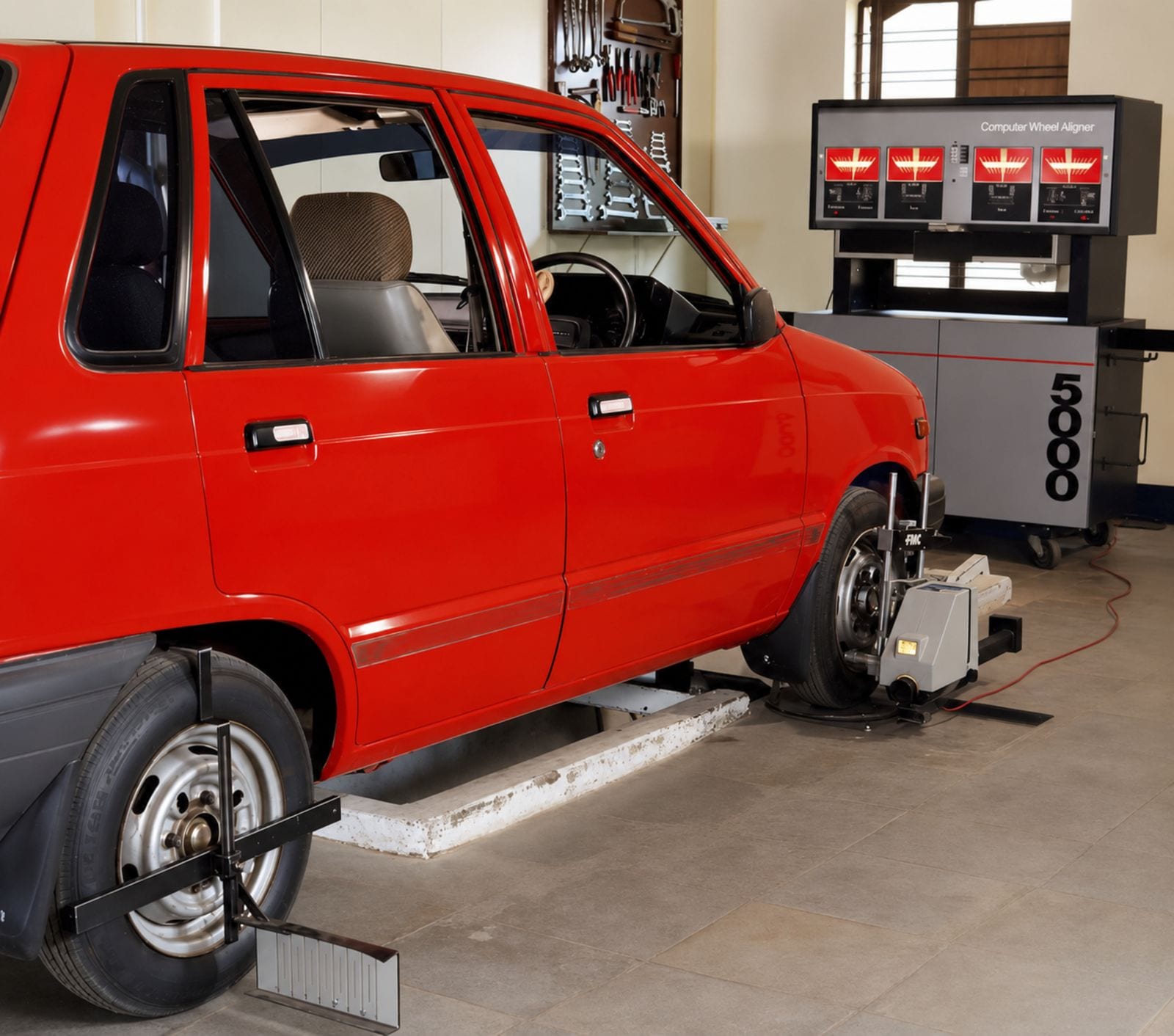 A car on computerized wheel-alignment equipment