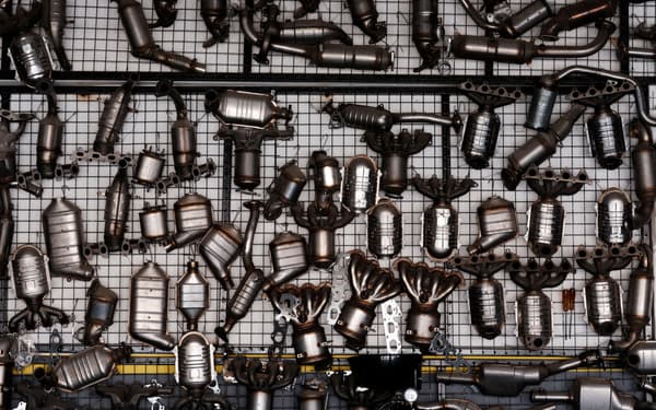 An assortment of exhaust parts and catalytic converters