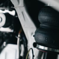 Close-up of a car's rubber suspension bushings